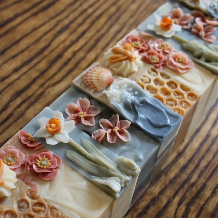 A collection of different Loam and Lather soap