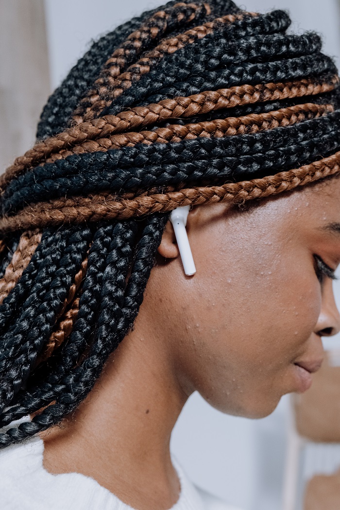A black woman with her hair in braids A
black woman with her hair in braids
