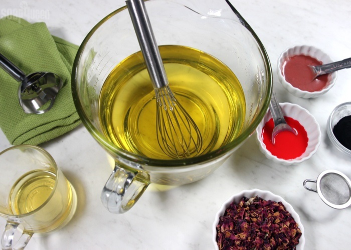 Soap ingredients set out on a white table