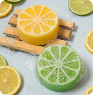 small round yellow and green soaps designed to look like fruit slices
