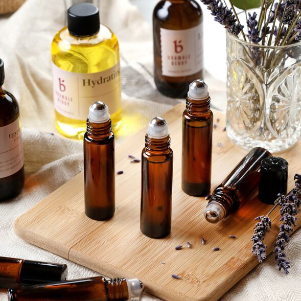 aromatherapy body oil in amber glass
                roller bottles | bramble berry