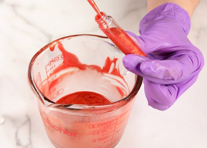 putting gloss into a tube | bramble berry