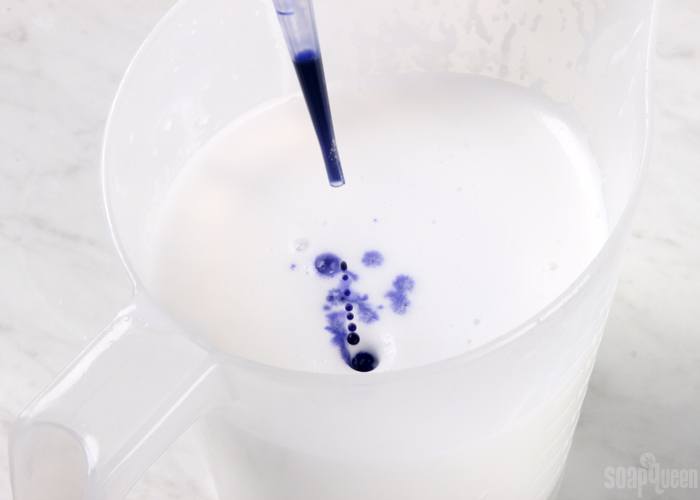 adding liquid dye to lotion