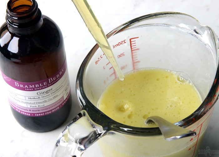 adding drops of ginger essential oil to
soap | bramble berry