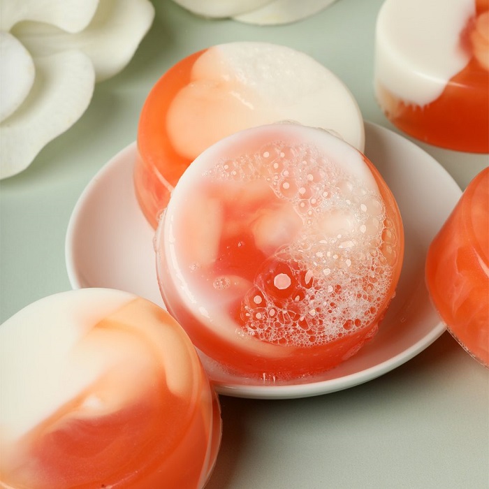Gardenia peach soap swirled with opaque
                and translucent soap